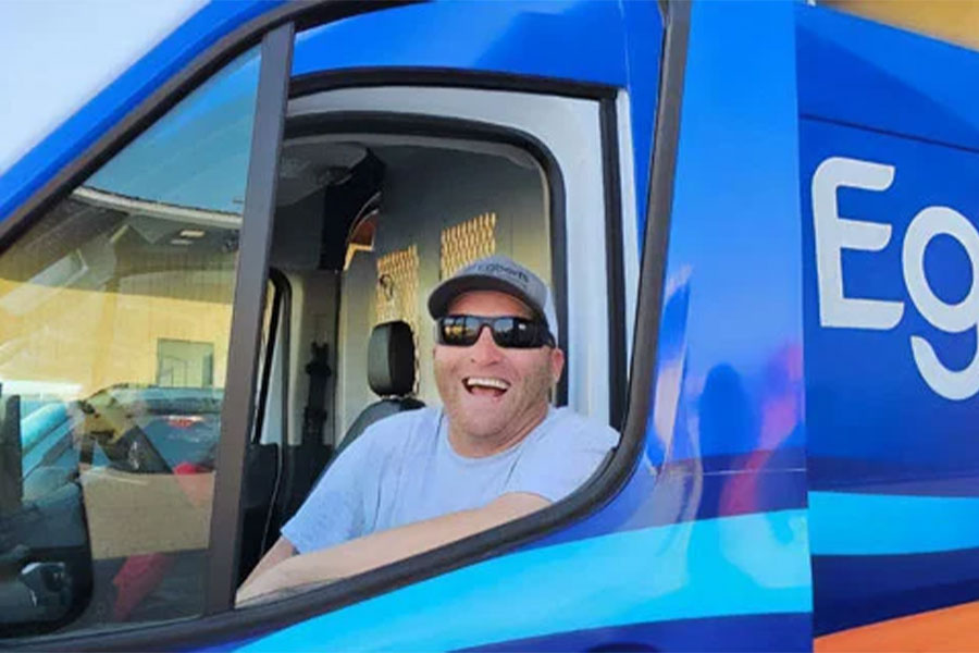 Egberts HVAC tech smiling proudly