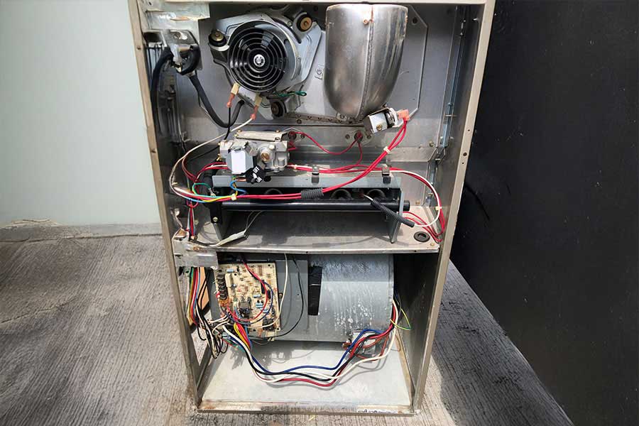 Exposed wiring during furnace repair