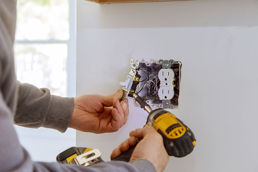 Electrical outlet installation in progress