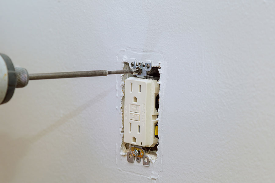 Electrical outlet repair & installation services in progress