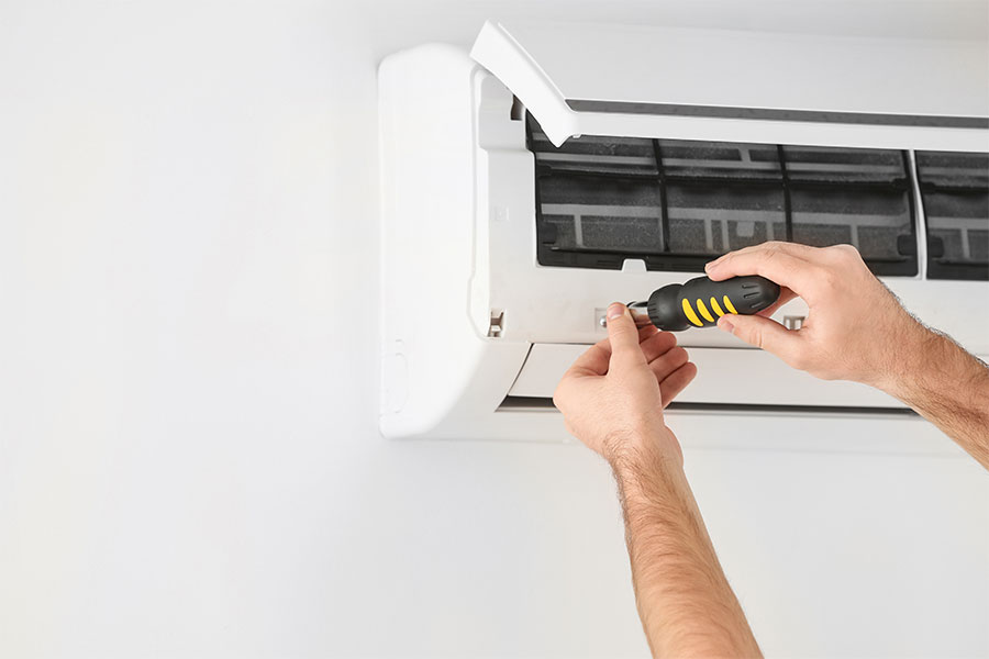 HVAC technician completing ductless mini split installation